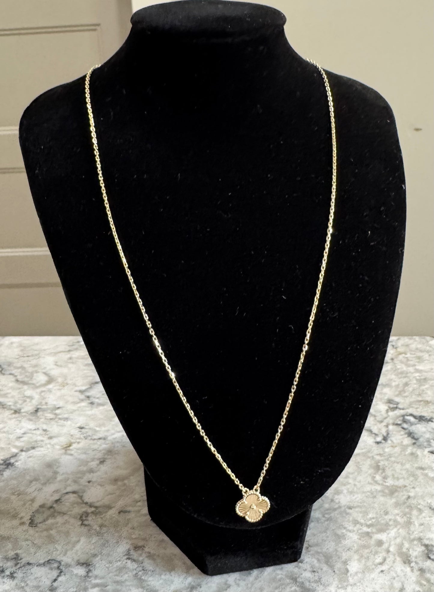 10K gold 18” necklace with clover pendant